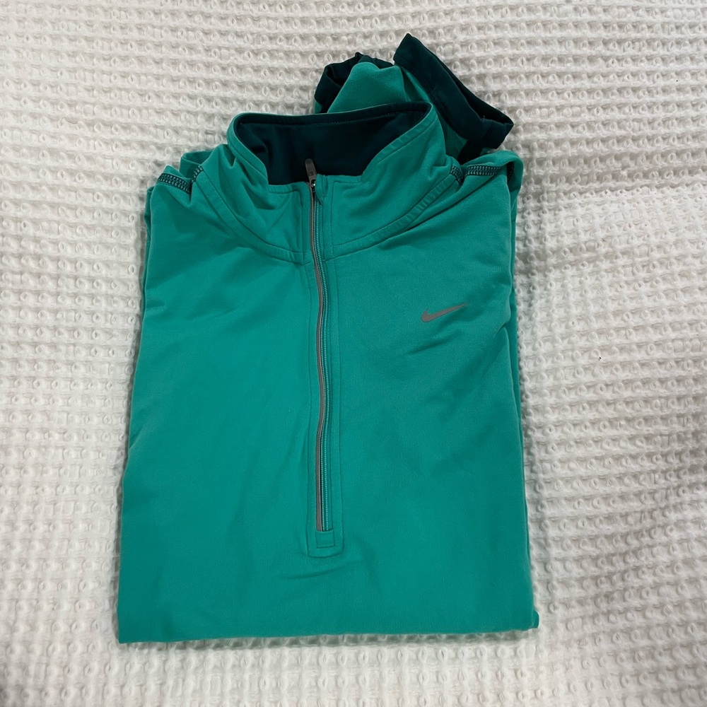 Nike running top. Worn less than 5 times. Small
